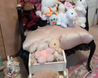 Collection of Stuffed Bunnies and a Teddy Bear on a Victorianstyle Chair, including Wendy Brent and Russ brands