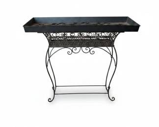 Ornate Wrought Iron Console Table with Urn and Candlestick