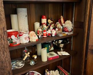 Christmas decorations, mugs, handmade pottery mugs in oak wardrobe