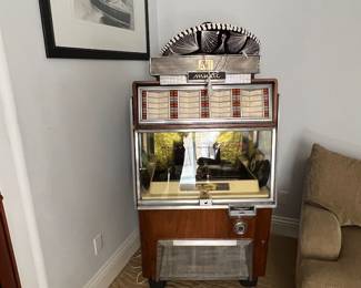 AMI Jukebox - works!  You just get a small shock when you plug it in... 