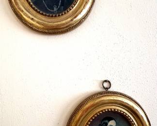 Small framed portraits