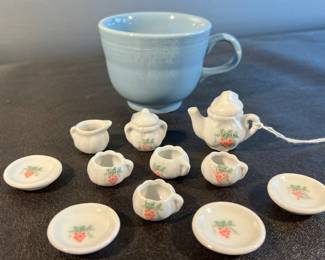 Miniature tea set, cup for comparison