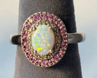 j Sterling Silver Ring with Oval Opal Center Stone and Halo of Small Pink Gemstone