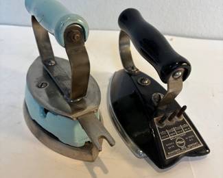 an Winpower Model 64PS Electric Iron and Coleman Model 4A Instant Lite Gas Iron Set