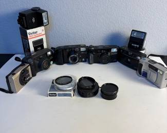 e Six Classic Cameras with Additional Lenses and Flash Units
