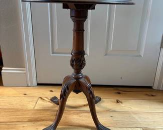 an Neoclassical Carved Wood Pedestal Table