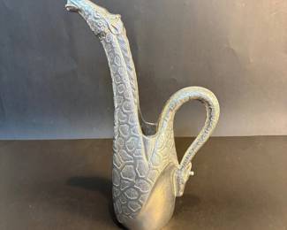 an Arthur Court Aluminum Giraffe Pitcher