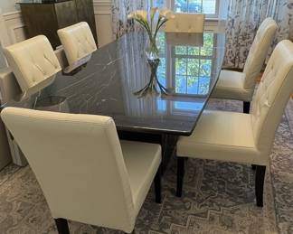 Modern Faux Marble Dining Table with Tufted Upholstered Chairs