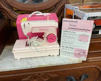 Sears Childs sewing machine with paper work and case
