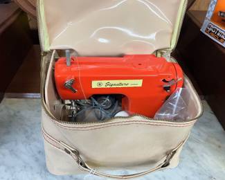 Signature small sewing machine in bag