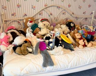 Iron daybed with stuffed animals