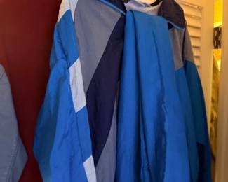 Men's jackets and outerwear on hangers