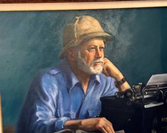 Framed portrait of man at typewriter