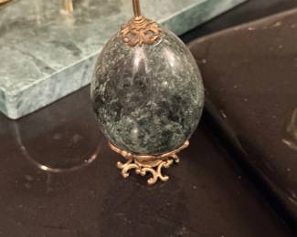 Marble egg on brass stand