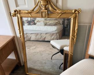 Ornate gold floor mirror