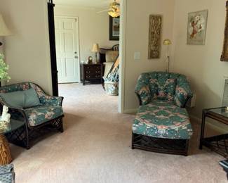 Living room with floral upholstered chairs