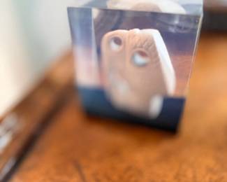 Lucite block with embedded carved figure
