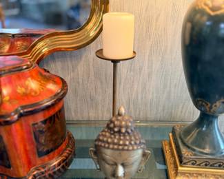 Silver Buddha head and lamp decor