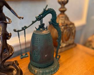 Bronze dragon temple bell on stand