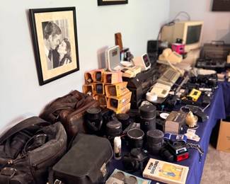 Table of cameras, lenses and bags