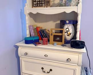 White dresser with hutch and decor