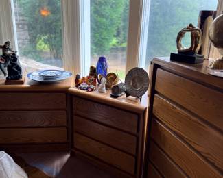 Wood dresser with decor and crystals by window