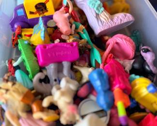 Bin of small plastic toys