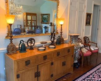 Burlwood sideboard with gilt mirror and candlesticks