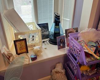 Bedroom corner with framed art and decor