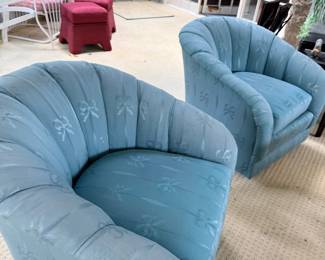 Pair of blue upholstered barrel chairs