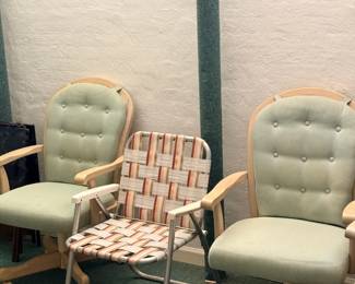 Green upholstered chairs and lawn chair