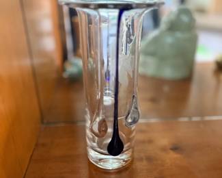 Art glass vase with black swirl