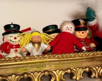 Christmas figurines on gold tray
