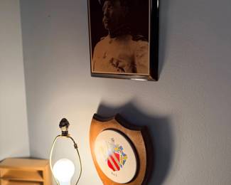 Framed vintage portrait and military crest