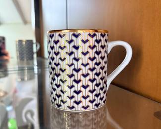 Porcelain mug with blue and gold pattern