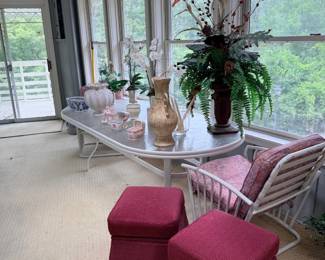 Sunroom set with table and red ottomans