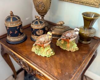 Carved table, jasperware jars and bird figurines
