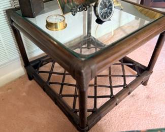 Glass-top side table with decor