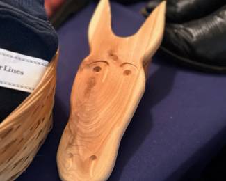 Carved wood horse head sculpture