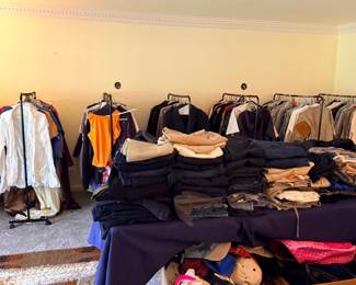 Racks of clothing and apparel