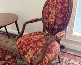 French carved armchair with red upholstery