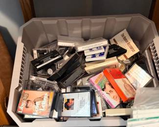 Bin of cassette tapes and CDs