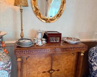 Burlwood sideboard with gilt oval mirror
