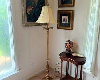 Brass floor lamp and side table