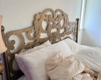 Ornate carved wood headboard bed