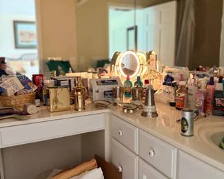 Bathroom vanity with toiletries and mirror