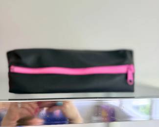 Black and pink clutch bag