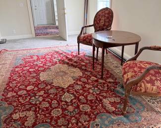 Antique drop-leaf table and Persian rug