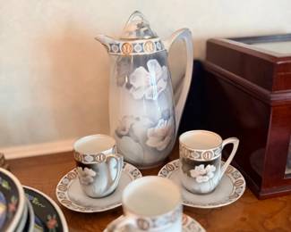 Porcelain chocolate pot with cups and saucers