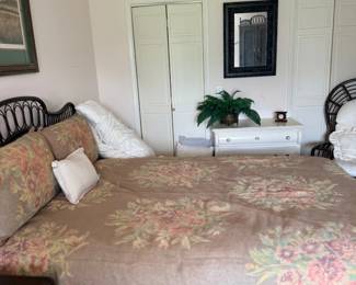 Bedroom with bed and floral comforter